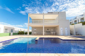 Beach Townhouses #106 - Conforto por Carpediem